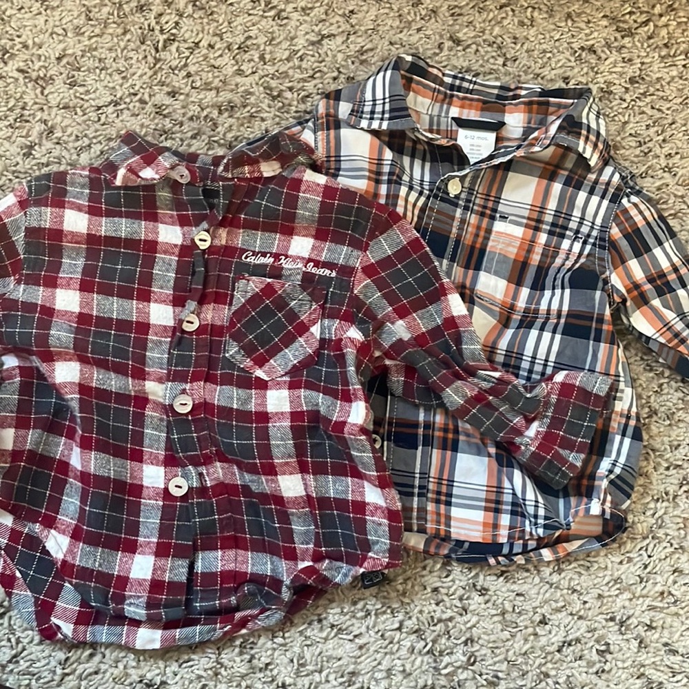 Two long sleeved plaid collared shirts